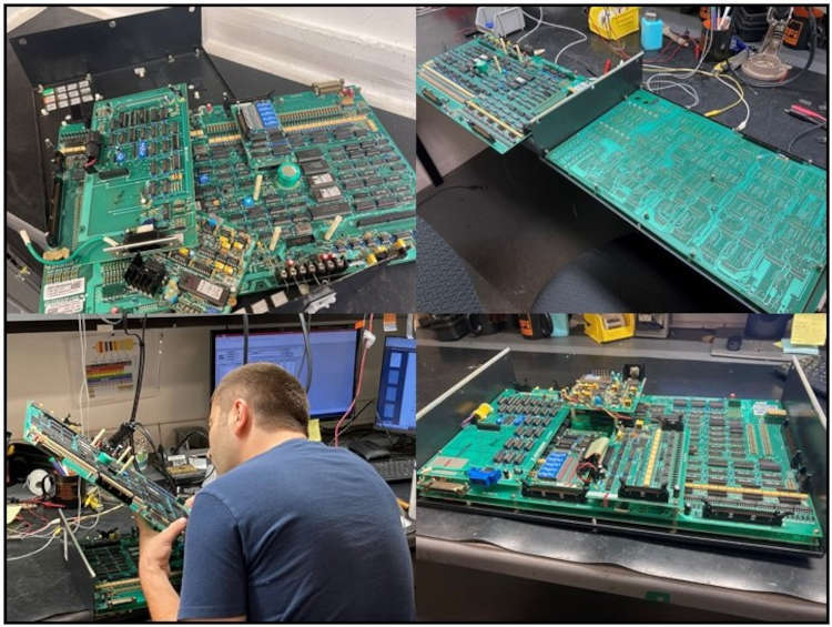 AFi Systems engineer repairing circuit board panel